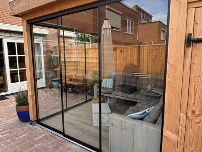 glazenschuifwand in veranda